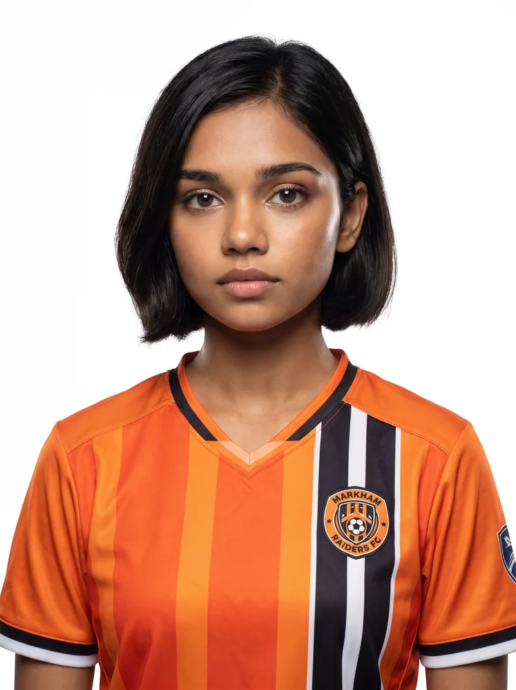 Kani, head and shoulders: shoulder-length black hair and an orange and black striped soccer jersey.